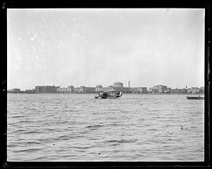 MacMillan airplane on Charles River in front of M.I.T.
