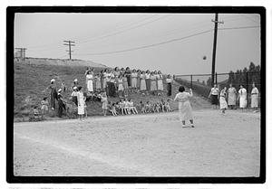 Women playing baseball