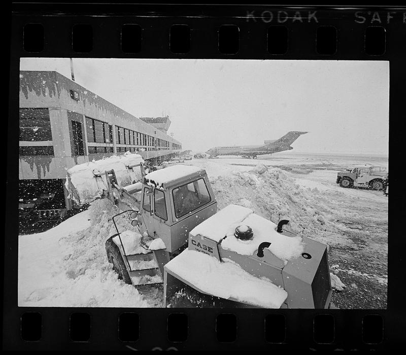 Clearing snow after blizzard at local Airport, East Boston