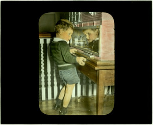 1890 Dollhouse and Boy