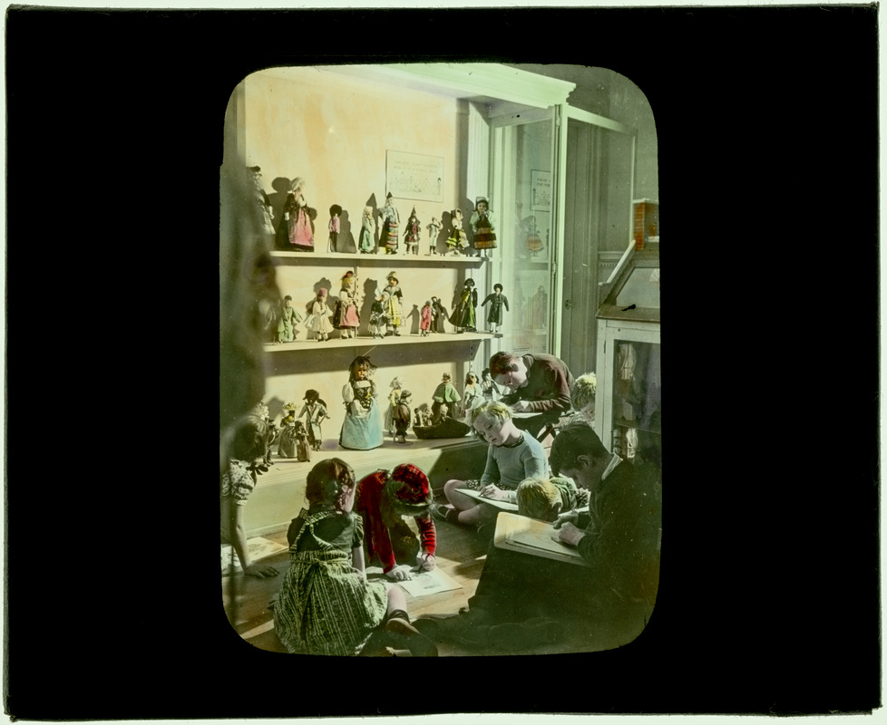 31 Game playing in front of doll case