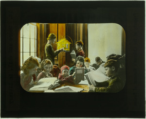 19 Moore and children in library