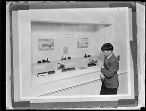 Boy looking at train exhibit