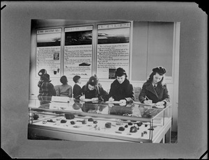 Children around geology exhibit