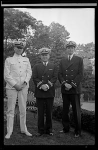 Three men in uniform