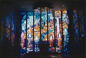 Stained glass windows depicting Christ and Apostles