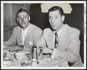 Two Hungry Tigers, Pitcher Hal Newhouser (left) and Catcher Joe Ginsberg, satisfy their appetites at Hotel Kenmore before last nights game. They also might be figuring out some strategy for that left field fence.