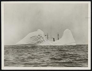 International Ice Patrol On Duty. A large berg observed by the Cutter Seneca. The Seneca stood by this berg for three days until disinigrated by the action of the warm water of the Gulf stream.