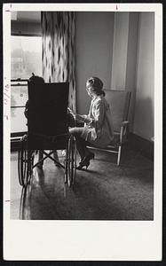 Volunteer reads to ill