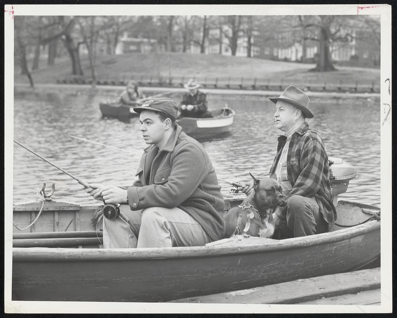 Anxious Anglers-Carmine Bova (left) of Revere and Robert Olinder of Jamaica Plain concentrate on the business at hand at Jamaica Pond today as they joined throngs of anglers who were on hand for opening of the fishing season. With Olinder is his bover dof, “Beau Jack.”