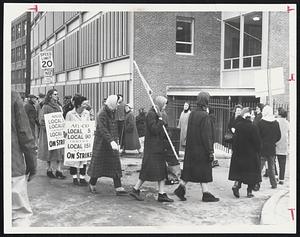 Women employes relieve men on picket line outside Bethlehem Steel Co.'s Quincy shipyard. They are members of Locals 90 and 151, two of the union locals on strike.