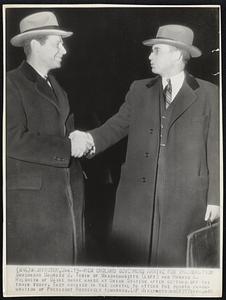 Washington. – New England Governors Arriver for Inauguration. Governors Maurice J. Tobin of Massachusetts (left) and Horace A. Hildreth of Maine shake hands at Union Station after getting off the train today. They arrived in the capital to attend the fourth inauguration of President Roosevelt tomorrow.