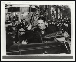 Maurice and Helen Tobin in a car, probably during a parade