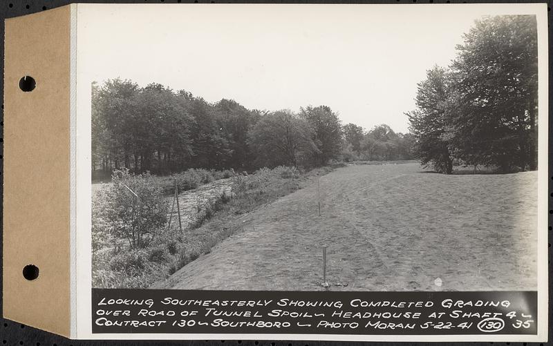 Contract No. 130, Grading, Loaming, and Grassing Vicinity of Shaft 4, Pressure Aqueduct, Southborough, and Improvement of Access Roads to the Intake Works and at Norumbega Reservoir, Marlborough, Southborough, Weston, looking southeasterly showing completed grading over road of tunnel spoil, headhouse at Shaft 4, Southborough, Mass., May 22, 1941