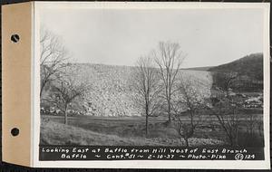 Contract No. 51, East Branch Baffle, Site of Quabbin Reservoir, Greenwich, Hardwick, looking east at baffle from hill west of east branch baffle, Hardwick, Mass., Feb. 10, 1937