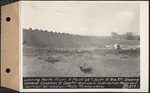 Contract No. 80, High Level Distribution Reservoir, Weston, looking north from a point 60 feet+/- south of Sta. 97+/- showing general condition of dam 5, high level distribution reservoir, Weston, Mass., May 29, 1940