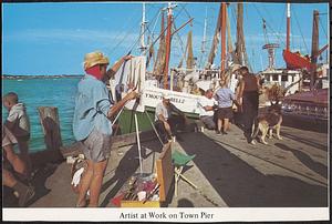 Artist at work on town pier