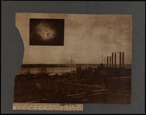 Fast fading light. Roof top view of New Bedford, MA waterfront along Acushnet River looking toward Fairhaven, MA shore during solar eclipse