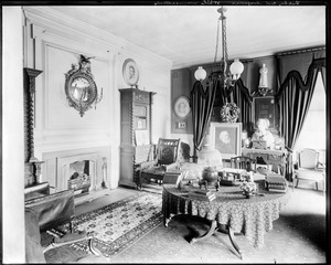 Unidentified interior, possibly a sitting room (with what is possibly a portrait of Longfellow)