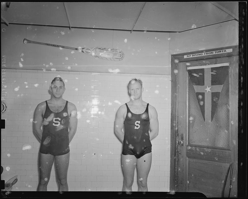 Two swimmers in pool locker room