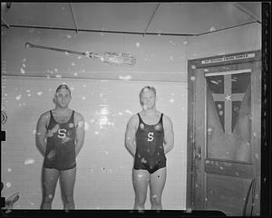 Two swimmers in pool locker room