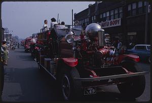 Antique fire engine in parade, Union Square, Somerville, Massachusetts