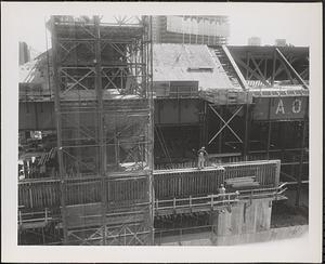 Construction of Boylston Building, Boston Public Library, workmen on scaffolding, Exeter Street façade