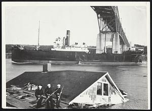 Death came out of the skies and the sea for five who were trapped in this house at Bourne, under the bridge spanning the Cape Cod canal.