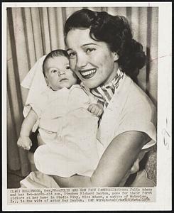 Julie and Son Face Camera - Actress Julie Adams and her two-month-old son, Stephen Richard Danton, pose for their first picture at her home in Studio City. Miss Adams, a native of Waterloo, Ia., is the wife of actor Ray Danton.