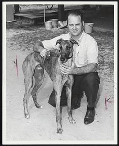 Top Winner-Wayne Strong, top money winner at Raynham Park last year, holds his star racer. Learn How prior to weighing in this season at the Bristol County Oval.