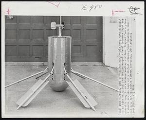 Weather Robot -- This Navy "Grasshopper," one of the nine being built at the Indianapolis Naval Ordnance Depot for Antarctic use, is an airborne weather station. Dropped from a plane, it shoots out six legs and a 20-foor antenna, then broadcasts weather data for six months without servicing.