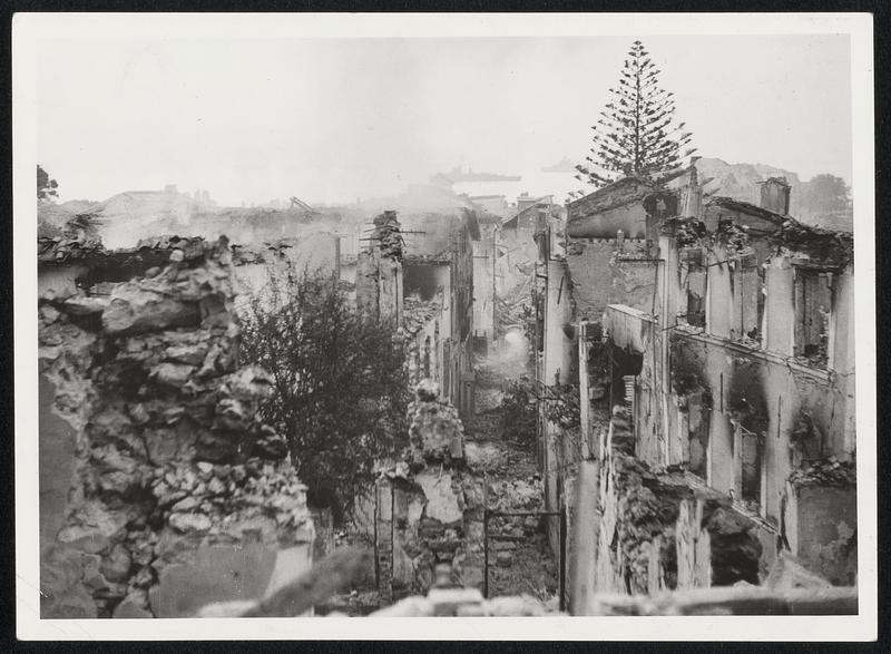 Ionian Islanders Rebuild. Nature's fury caused almost unbelievable destruction and loss of life recently when earthquakes ripped the Ionian Islands of Greece. Above, one of the island's communities looks as if it was blasted by an atom bomb. Below are some scenes of the relief work and repair begun in the stricken area.