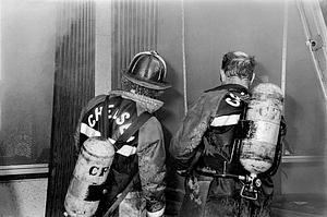 Left to right, Chelsea firefighters Paul Sweeney and Dick Collette operating at the J.J. Newberry fire