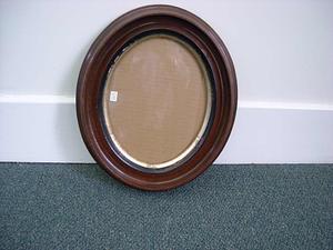 Oval frame with gilt and ebonized inserts