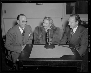 A. N. Armstrong and two unidentified people at WCOP microphone