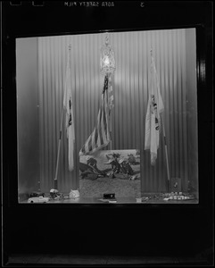 Display with flags, dioramas, Women's Defense Corps hat, and photo of Women's Defense Corps training
