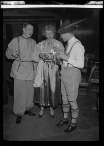 Mr. and Mrs. Edward L. Francis and Charles R. L. Sturgis at the costume supper dance following Skating Club of Boston carnival