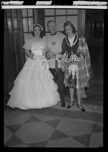 Mary R. Frost, Frederick Bruce Robinson, and Mrs. Arthur Lithgow Devens Jr. at the costume supper dance following the Skating Club of Boston carnival