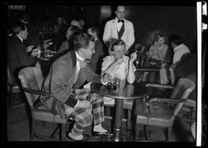 Robinson McIlvaine and Eilnor Fay at the costume supper dance following the Skating Club of Boston carnival