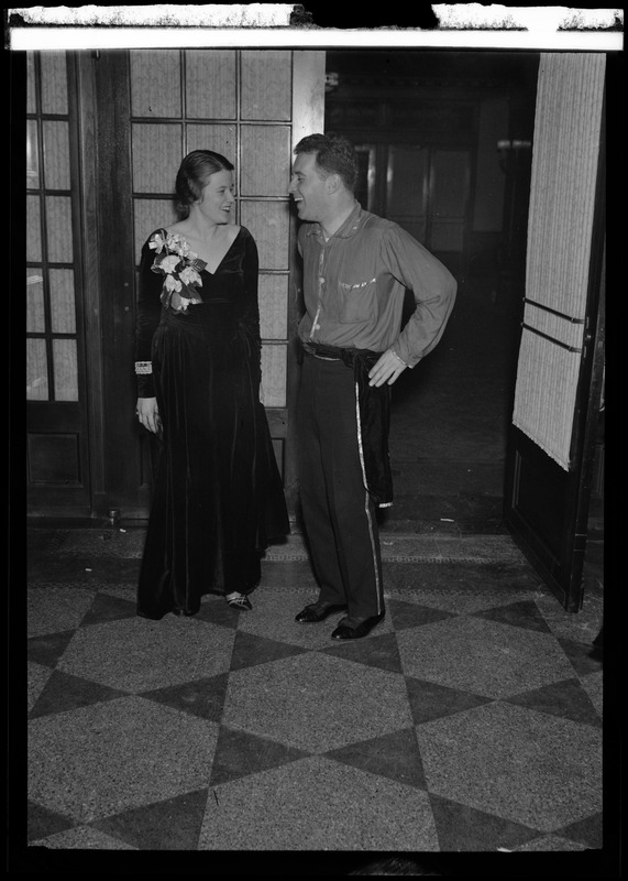 Juliet Carter and an unidentified man at the costume supper dance ...