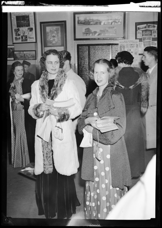 Mary Elizabeth Lowe and Catherine Brown selling programs at the costume supper dance following the Skating Club of Boston carnival