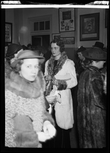 Mary Elizabeth Lowe selling programs at the costume supper dance following the Skating Club of Boston carnival