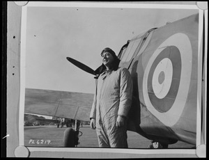 Unidentified man, possibly Steve Day, with plane