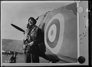 Unidentified man, possibly Steve Day, with plane