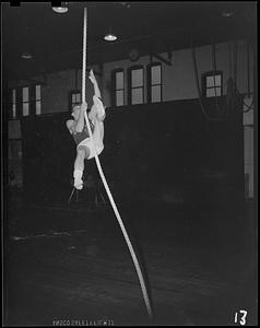 SC gymnast climbing rope