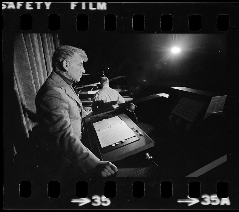 Leonard Bernstein rehearses a speech at Harvard's Sanders Theatre, Cambridge