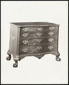 Serpentine-Front Drawers--This chest of drawers with its serpentine front is the style at which Jonathan Gostelower, the 18th century cabinet-maker, excelled. Only the finest colonial artisans were capable of turning out such