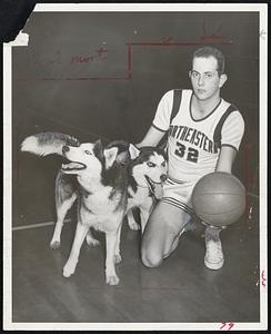 Capt. Ward Sears of Northeastern's basketball of two Siberian Huskies from Ashland due to Feb. 3-4. Owned by Anna Mae Forsberg, and Ch. Monadnock Sauda Bakko.