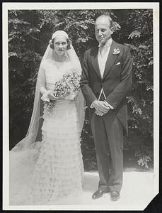 Mr. and Mrs. Charles Francis Adams, Jr. (Margaret Stockton), after their wedding at noon yesterday in St. John's Church, Manchester, which was followed by a reception at the North Shore summer home of the bride's parents, Mr. and Mrs. Philip Stockton of Beacon street. Mr. Adams is the son of former Secretary of the Navy and Mrs. Charles Francis Adams of Commonwealth avenue and Scituate.