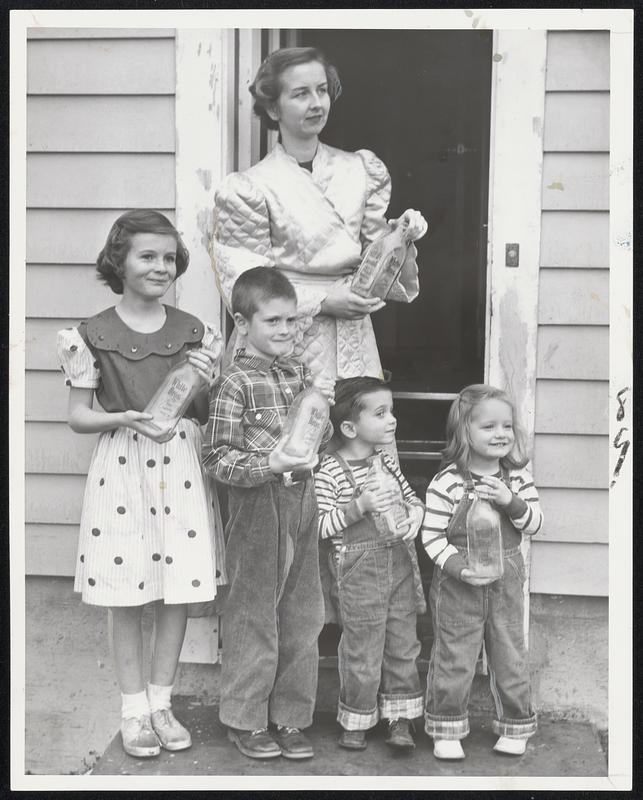 Maybe a Cow'll Come by!--But the milkman won't be along today for Mrs. Charles Courtney of Squantum and her four youngsters--or for thousands of other Greater Boston mothers. The young Courtneys are (left to right), Joan, 10, Richard, 6, James, 3, and Jean, 2.